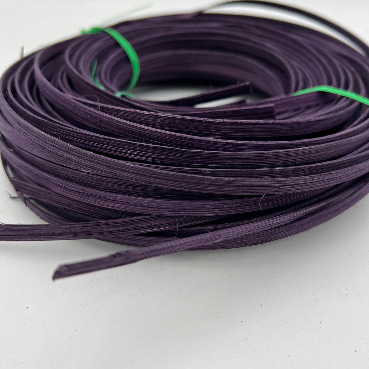Plum - 1/4" Flat - Dyed Reed (1/4 lb coil)